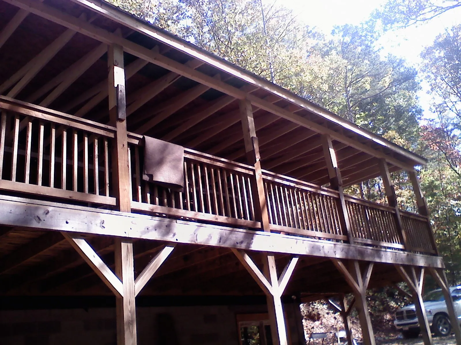 Timber framing under a new elevated porch and deck — Roof Leak Repair in Eckert by Roofing Brothers